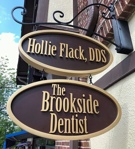 Exterior HDU Hanging Signs with Acrylic Dimensional Letters for The Brookside Dentist in Kansas City, Missouri