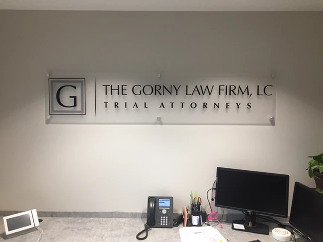 Interior Frosted Acrylic with Cut Vinyl Logo & Lettering and Brushed Aluminum Standoffs for The Gorny Law Firm in Kansas City, Missouri