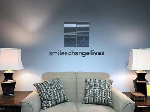 Interior Stainless Steel Dimensional Logo for Smiles Change Lives in Kansas City, Missouri