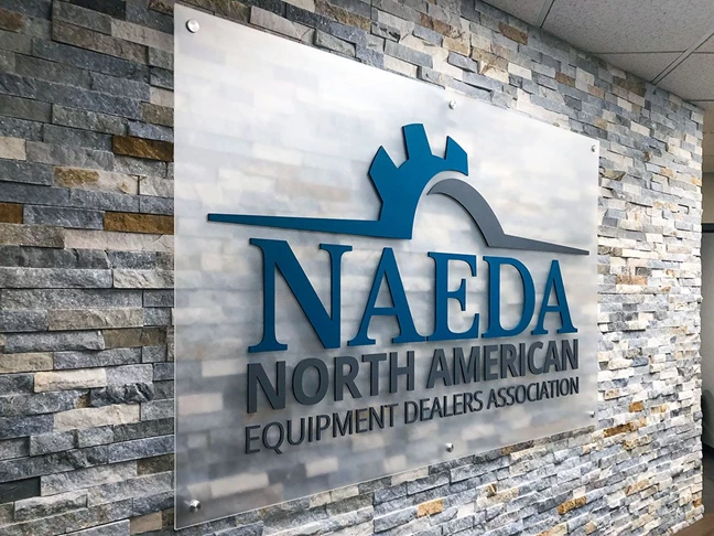 Frosted Acrylic with Custom Painted Dimensional Letters and Brushed Silver Standoffs for NAEDA in Kansas City, Missouri
