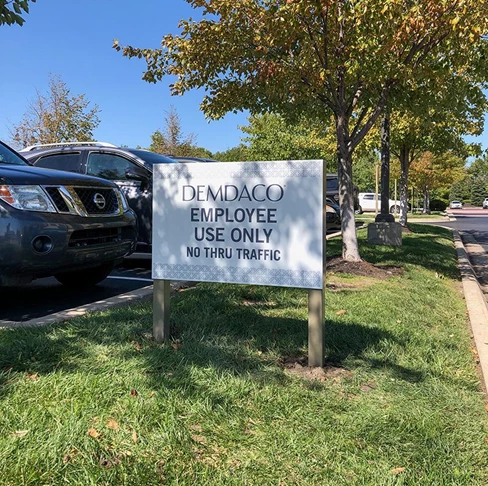 Exterior Reflective Metal Parking Sign for Demdaco in Leawood, Kansas