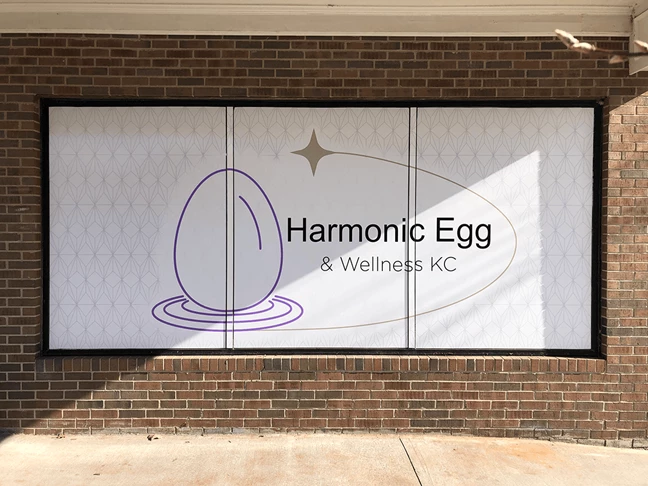 Perforated Window Vinyl for Harmonic Egg and Wellness in Lenexa, Kansas