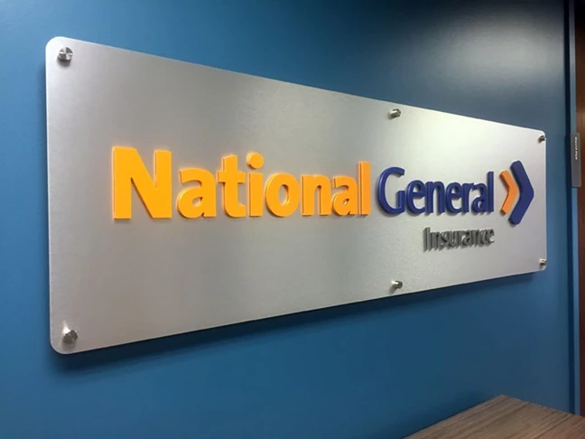 Brushed Aluminum Sign with Standoffs on behalf of Brown Graphics for National General Insurance in Kansas City, Missouri