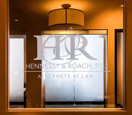 Interior Frosted Etched Vinyl Logo for Window Glass at Hennessy & Roach, P.C. in Overland Park, Kansas