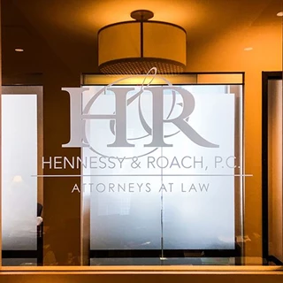 Interior Frosted Etched Vinyl Logo for Window Glass at Hennessy & Roach, P.C. in Overland Park, Kansas