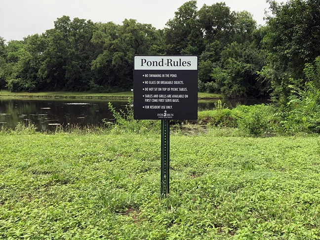 Exterior Pond Sign with Post for Fox Run Apartments in Shawnee, Kansas