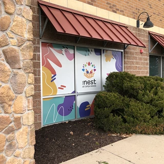 Window and Door Graphics for Open Minds Child Development in Olathe, Kansas