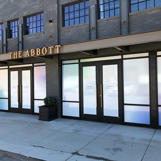 Perforated Window Vinyl Graphics for The Abbott in Kansas City, Missouri