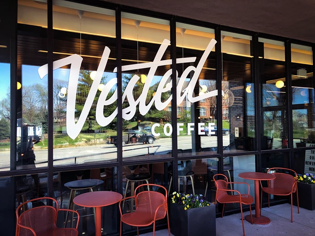Cut White Vinyl Window Graphic for Vested Coffee in Kansas City, Missouri