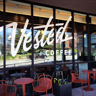 Cut White Vinyl Window Graphic for Vested Coffee in Kansas City, Missouri