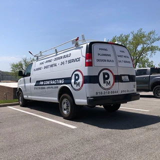 Partial Vehicle Fleet Graphics for PM Contracting in Grandview, Missouri