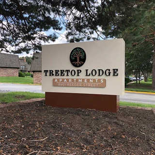Aluminum Monument Sign with Dimensional Logo and Lettering for Treetop Lodge Apartments in Overland Park, Kansas